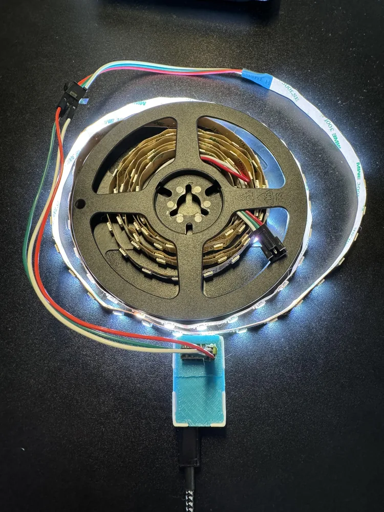 WS2812B strip lit up in color behind a bed, driven by the MSR-2